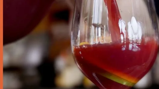 Red sangria poured in wine glass, catas, mixed up, newark