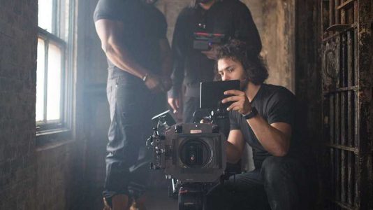 Robert Wilmote looking at shots taken with Director Yuri Alves