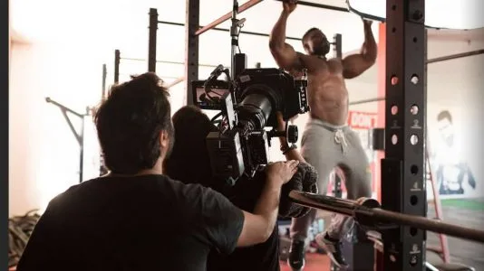 Yuri Alves directing Robert Wilmote working out in GRIND
