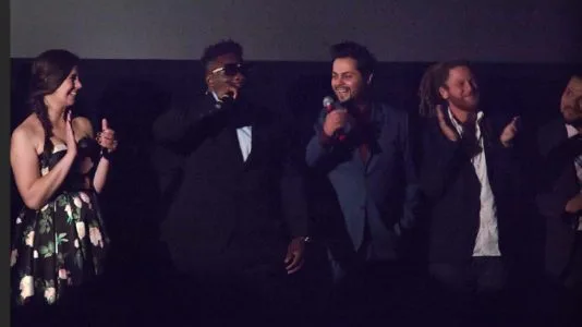 Yuri Alves and team in a theater