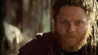 Tommy Cuba looking at camera