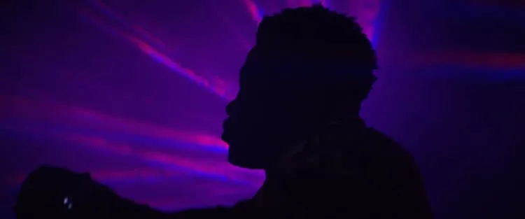 Robert Wilmote silhouette with party lights