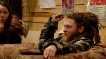 Tommy Cuba on a couch