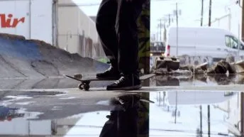 Tommy Cuba's feet and skateboard