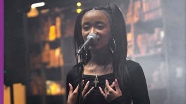 LOTYS rapping into mic