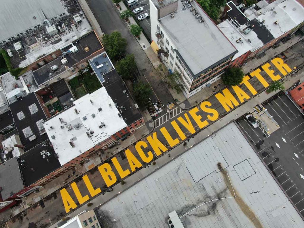 Aerial view of the ALL BLACK LIVES MATTER street mural on Halsey Street, Newark.